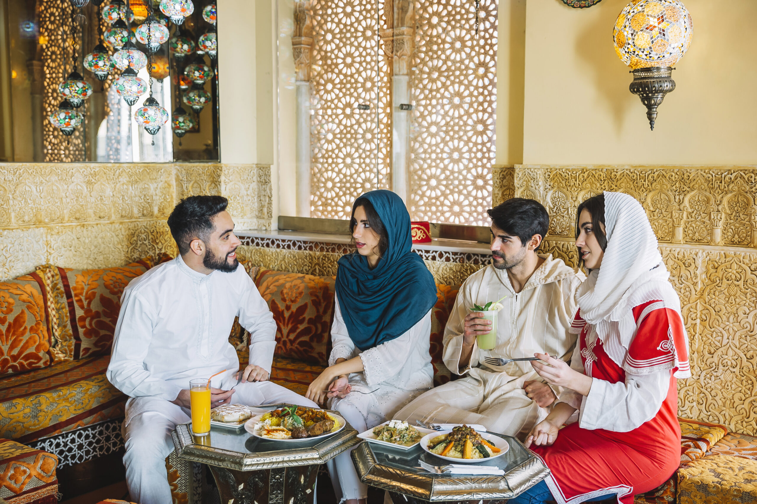 group-four-muslim-friends-restaurant